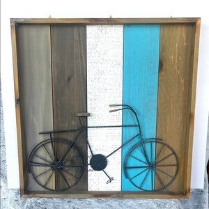 Rustic Metal Bicycle Wall Art on Wood Planks with Blue Accent
